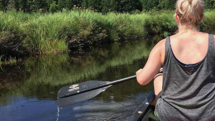 Canoe through connected lakes in the Adirondacks