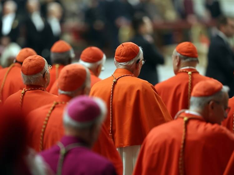 What is a conclave and how is a new pope decided?