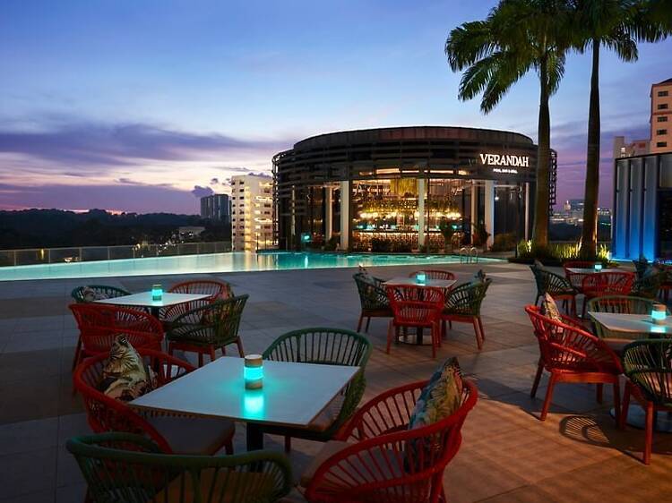 This scenic pool bar in Singapore has a happy hour promotion with $9 cocktails and bar bites This scenic pool bar in Singapore has a happy hour promotion with $9 cocktails and bar bites